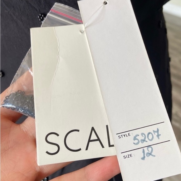 Beautiful black dress. Brand New with tags. - Picture 7 of 10